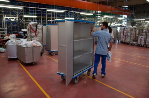 Cupboard trolley and spring-loaded base trolley in daily hospital use